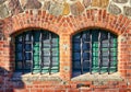 Window detail of two windows in an old natural stone building Royalty Free Stock Photo